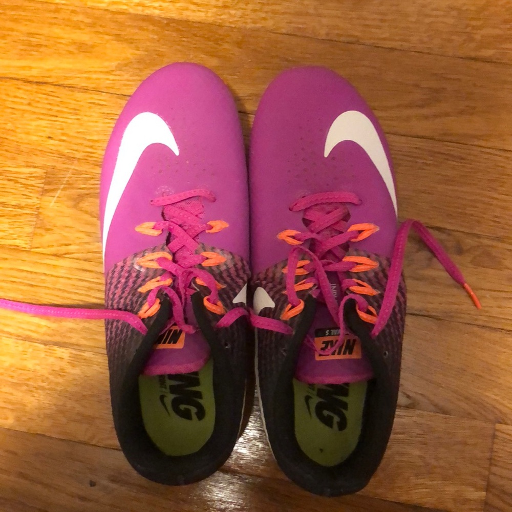Nike track spikes running shoes.